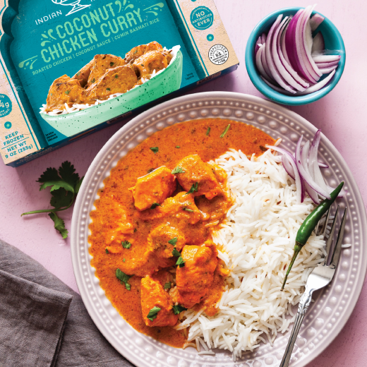 Lifestyle plated shot of coconut chicken curry